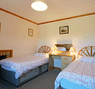 Schlafzimmer mit 2 Einzelbetten